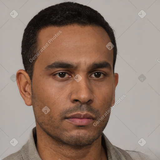 Neutral latino young-adult male with short  black hair and brown eyes