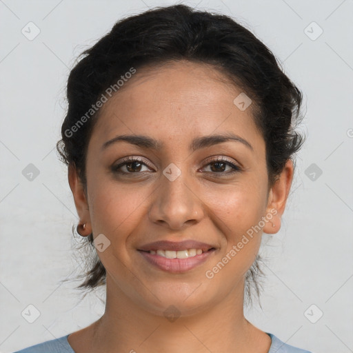 Joyful latino young-adult female with short  brown hair and brown eyes