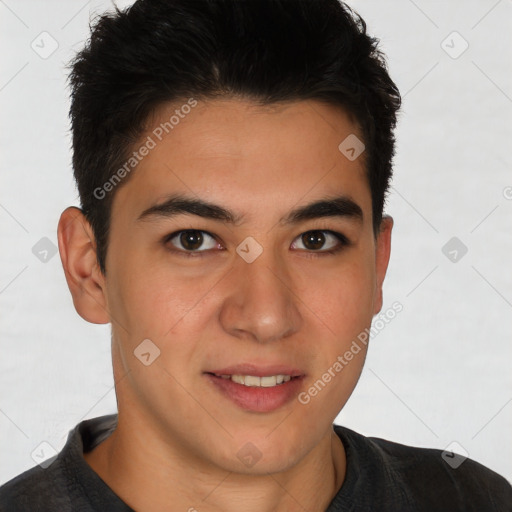 Joyful asian young-adult male with short  brown hair and brown eyes