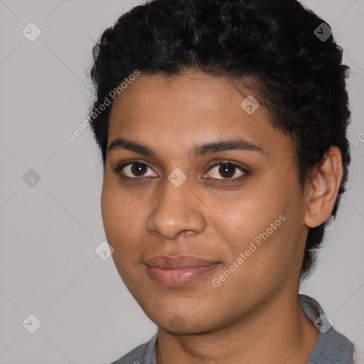 Joyful latino young-adult female with short  black hair and brown eyes