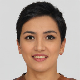 Joyful asian young-adult female with short  black hair and brown eyes