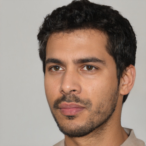 Neutral latino young-adult male with short  black hair and brown eyes