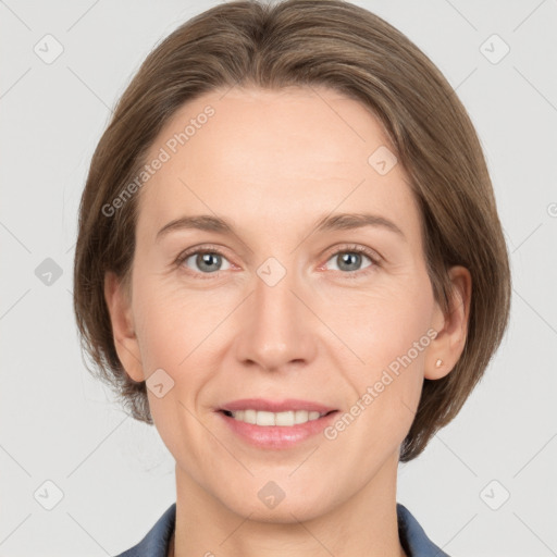 Joyful white adult female with medium  brown hair and grey eyes