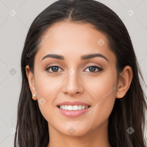 Joyful white young-adult female with long  brown hair and brown eyes