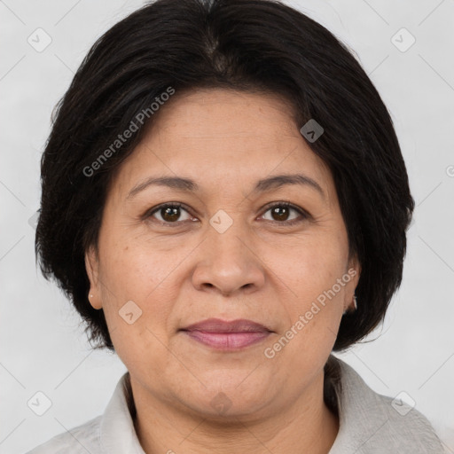 Joyful white adult female with medium  brown hair and brown eyes