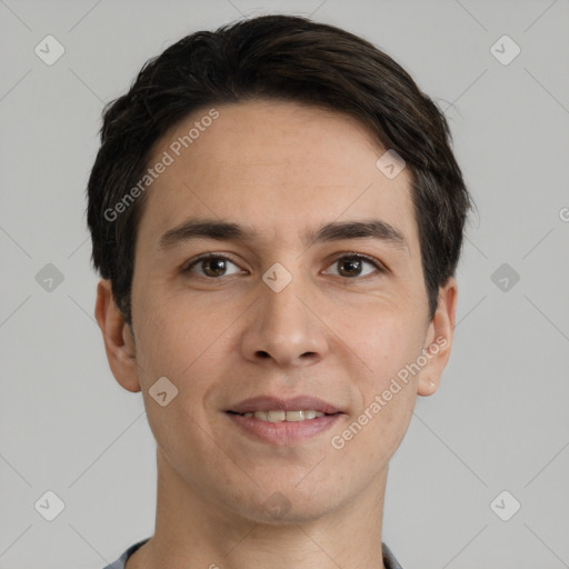 Joyful white adult male with short  black hair and brown eyes