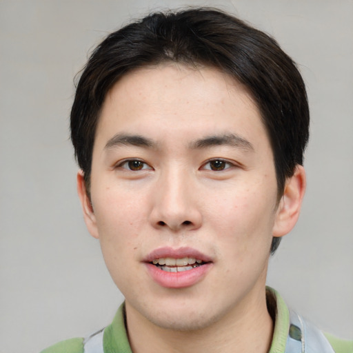 Neutral asian young-adult male with short  brown hair and brown eyes
