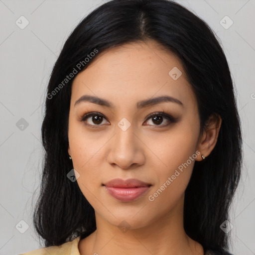 Joyful latino young-adult female with medium  black hair and brown eyes