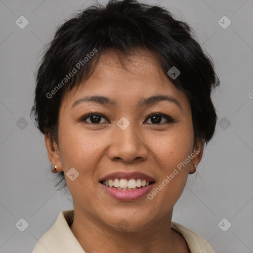 Joyful asian young-adult female with short  brown hair and brown eyes