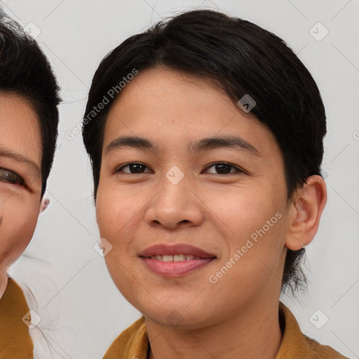 Joyful asian young-adult female with medium  brown hair and brown eyes