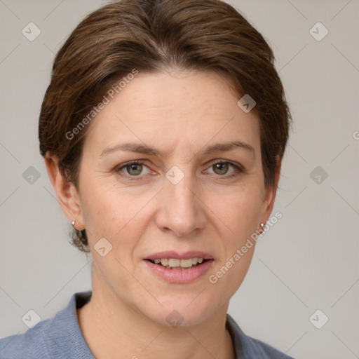 Joyful white adult female with short  brown hair and grey eyes