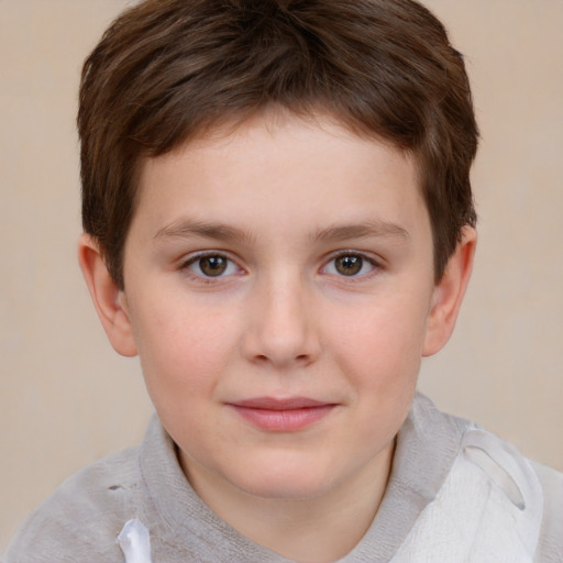 Joyful white child male with short  brown hair and brown eyes