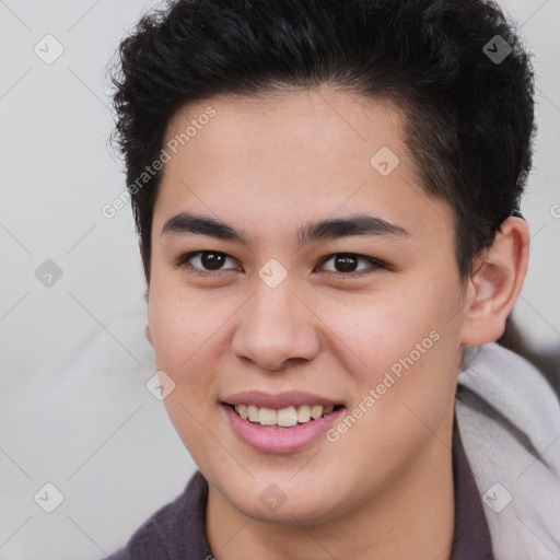 Joyful latino young-adult female with short  brown hair and brown eyes