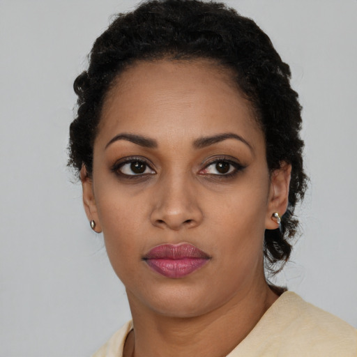 Neutral black young-adult female with long  black hair and brown eyes
