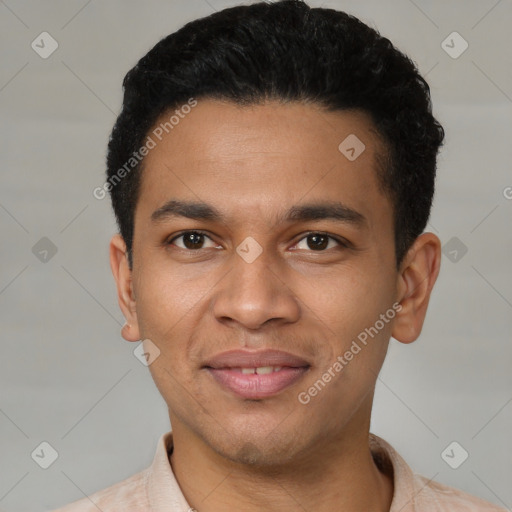 Joyful latino young-adult male with short  brown hair and brown eyes