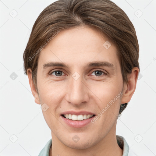 Joyful white young-adult female with short  brown hair and grey eyes