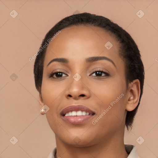 Joyful latino young-adult female with long  black hair and brown eyes