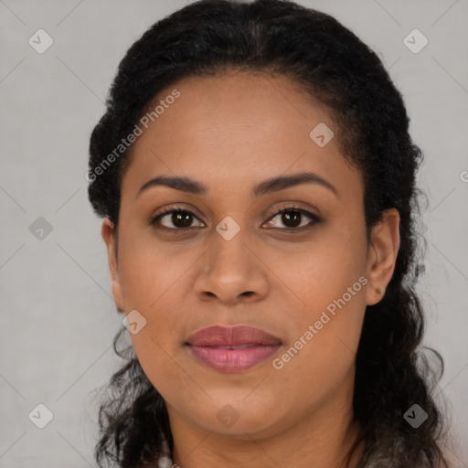 Joyful latino young-adult female with long  black hair and brown eyes