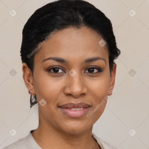 Joyful black young-adult female with short  black hair and brown eyes