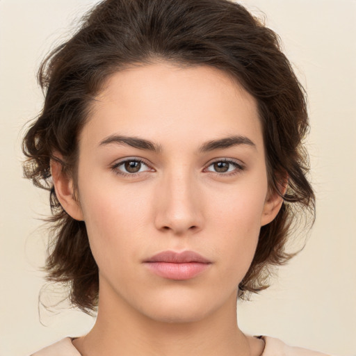 Neutral white young-adult female with medium  brown hair and brown eyes