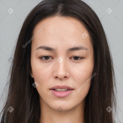 Joyful asian young-adult female with long  brown hair and brown eyes