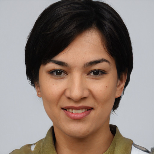 Joyful asian young-adult female with medium  black hair and brown eyes