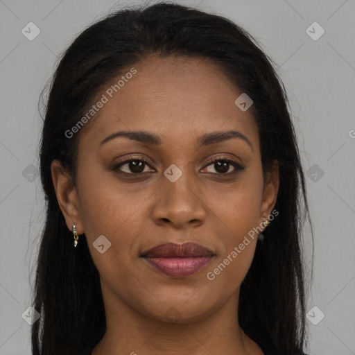 Joyful black young-adult female with long  brown hair and brown eyes