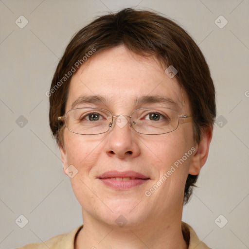 Joyful white adult female with short  brown hair and grey eyes