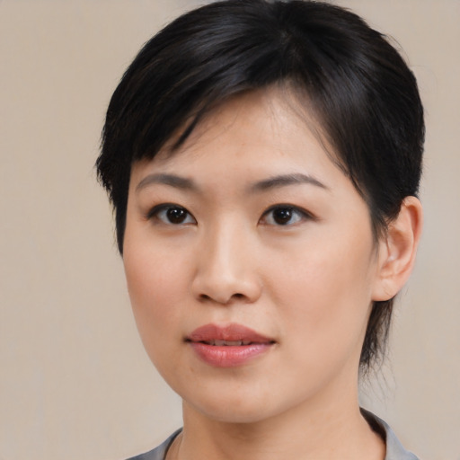 Neutral asian young-adult female with medium  black hair and brown eyes