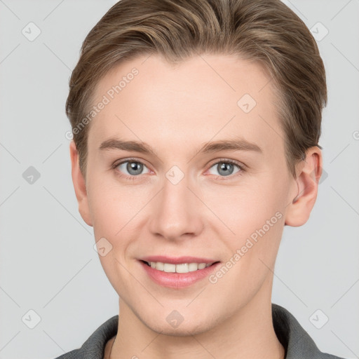 Joyful white young-adult female with short  brown hair and grey eyes