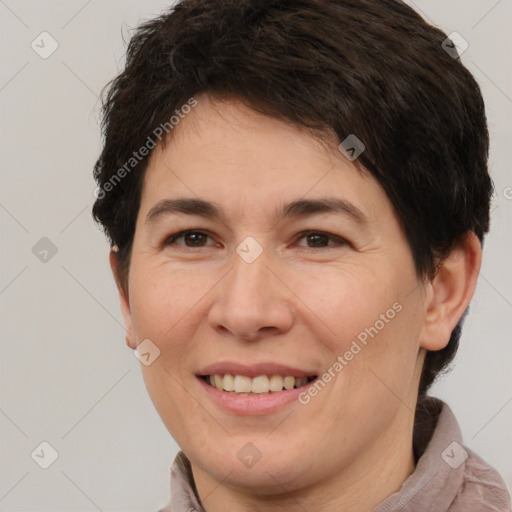 Joyful white adult female with short  brown hair and brown eyes