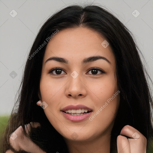 Joyful asian young-adult female with long  brown hair and brown eyes