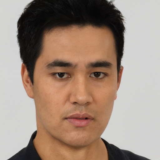 Neutral asian young-adult male with short  black hair and brown eyes