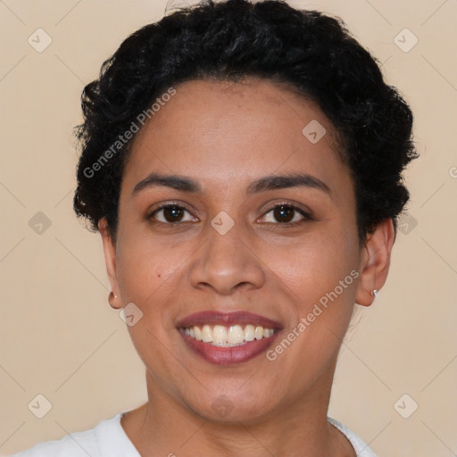 Joyful latino young-adult female with short  black hair and brown eyes