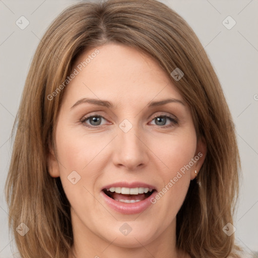 Joyful white young-adult female with long  brown hair and green eyes