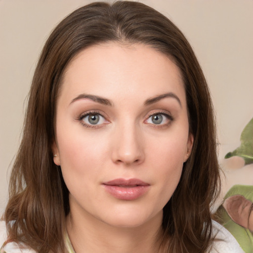 Neutral white young-adult female with medium  brown hair and brown eyes