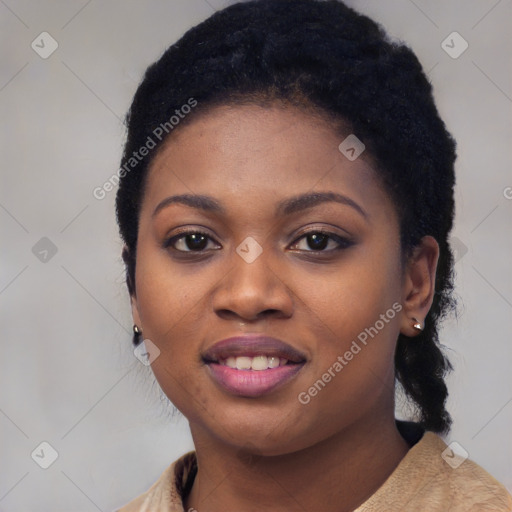 Joyful black young-adult female with long  black hair and brown eyes