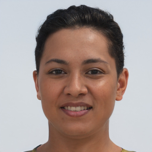 Joyful latino young-adult female with short  brown hair and brown eyes