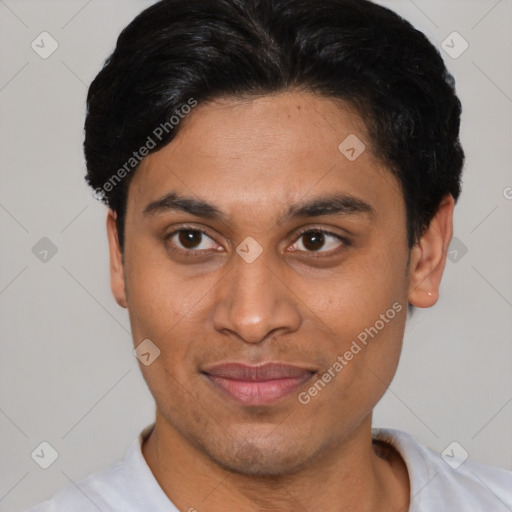 Joyful latino young-adult male with short  black hair and brown eyes