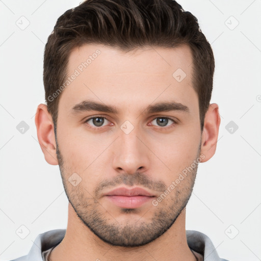 Neutral white young-adult male with short  brown hair and brown eyes