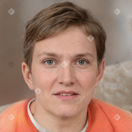 Joyful white adult female with short  brown hair and grey eyes