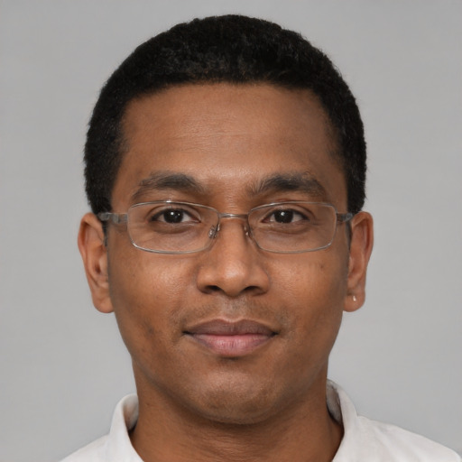 Neutral black adult male with short  black hair and brown eyes