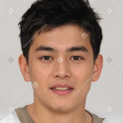 Joyful asian young-adult male with short  brown hair and brown eyes