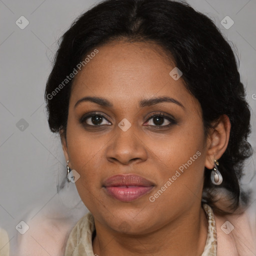 Joyful black adult female with medium  brown hair and brown eyes