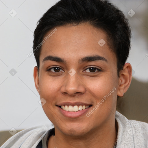 Joyful latino young-adult female with short  brown hair and brown eyes