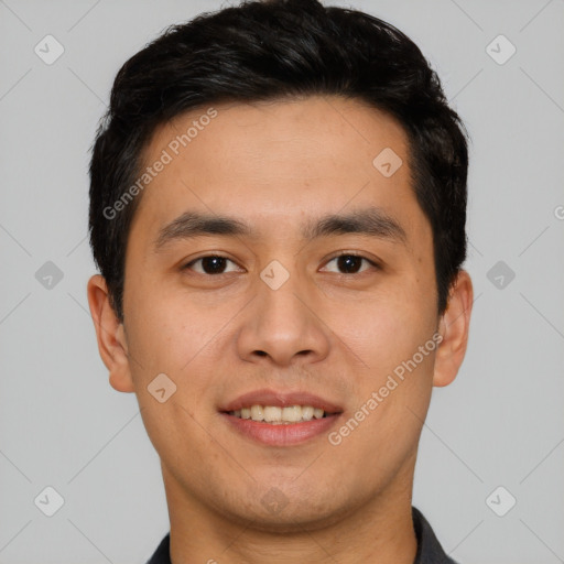 Joyful asian young-adult male with short  black hair and brown eyes