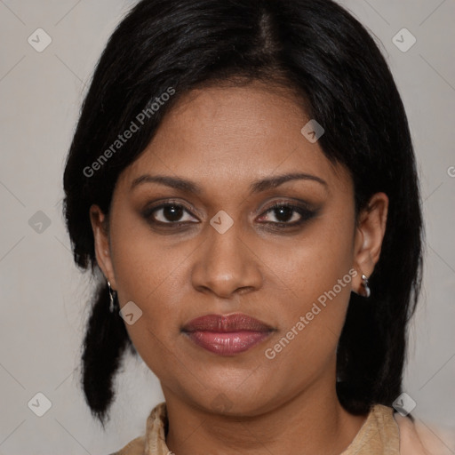 Joyful black young-adult female with medium  black hair and brown eyes