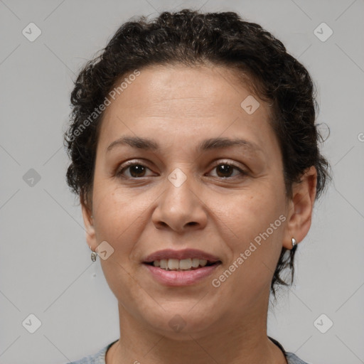 Joyful white adult female with short  brown hair and brown eyes