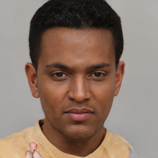 Neutral latino young-adult male with short  black hair and brown eyes