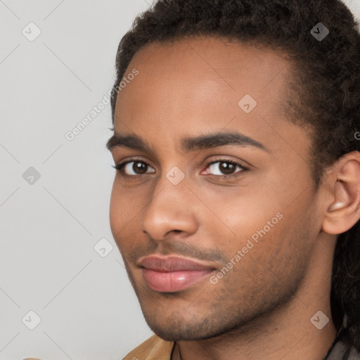 Neutral black young-adult male with short  brown hair and brown eyes